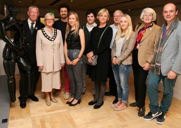 Mayor of Ballymena, Cllr. Audrey Wales, is pictured at the RDS national crafts competition in The Braid along with Alan Meredith (woodturner), David Horkan (Chairman of Royal Dublin Society Committee of Arts), Cathryn Hogg (textile artist), Brendan Madden (Weaver) and Adam Frew (ceramicist), Dara O'Leary (RDS), Nicola Gates (assistant curator Ballymena Museum) and Adam Frew. INBT38-203AC