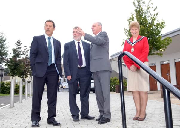 Banbridge Counsil chairman Olive Mercer along with Social Development Minister Nelson McCausland, Council chief executive Liam Hannaway and John Dobson, Banbridge Community Develo[ment Organisation  view the completed work in the Rathfriland Street area. INBL3713-RATHST2