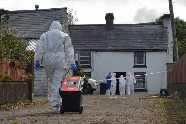 Forensic experts at the murder-suicide house on the Feystown Road Glenarm. INLT 38-017-PSB