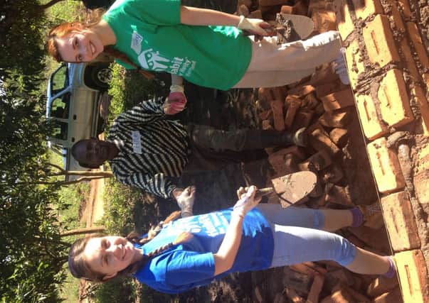 Wallace High School pupils Lauren Ferguson and Tiffany Slowik who helped build houses in Malawi over the summer as part of the Habitat for Humanity team from the Lisburn school.