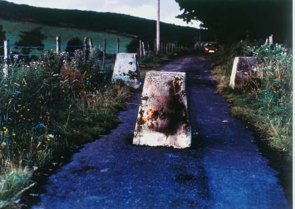 Willie Doherty's 'Border Road' (1994). Courtesy the artist; Alexander and Bonin, New York; Kerlin Gallery, Dublin; Galerie PeterKilchmann, Zurich; Matt's Gallery, London; and Galeria Moises Perez de Albeniz, Madrid.