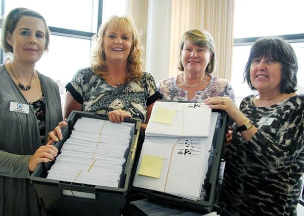 Annette McConkey, Rae Kirk, Mandy Massan and Hilda McDonald ready to sort out the electoral forms at the Ballymena office. INBT 39-803H