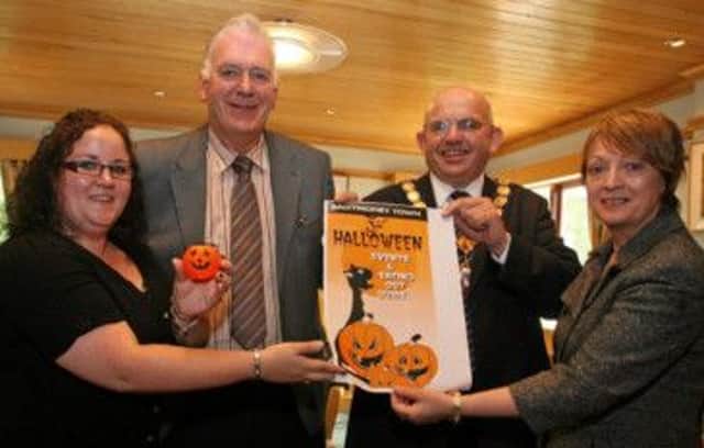 SCARY. Launching the Ballymoney Halloween Festival on Friday are Cllr Roma McAfee, Cllr Bill Kennedy, Chair of Development, Mayor Cllr John Finlay and Corporate Services Officer, Liz Johnston.INBM39-13 037SC.
