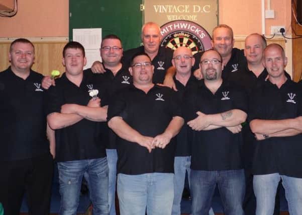 The Vintage dart team who sit top of the league after winning their first two matches of the season. INLM39-200