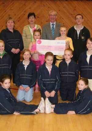 Members of the Fountain Dance Association receiving a £30,000 Big Lottery Fund a few years ago. Picture were members of the association with back row (from left), Wendy MacBean, dance coach, Isobel McNally, former principal, Fountain PS, William Houston and Tommy McCallion.
The group wants to convert a Londonderry toy shop into a dance studio.