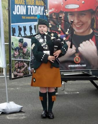 Karen pictured playing her pipes at Portrush Airshow this year with the Army Cadets.INBM40-13 100L