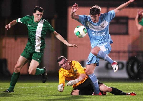 Ballymena United striker Michael McLellan attempts to get past Donegal Celtic goalkeeper Brian McGurk during the County Antrim Shield quarter-final. Picture: Press Eye.