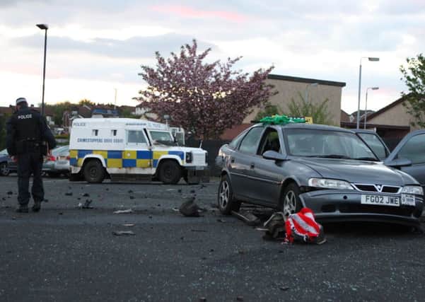 A damaged Vauxhall Vectra after a controlled explosion at Templemore Sports Complex during the Westminister count in 2010. A man was arrested on Wednesday in relation to republican atttempts to disrupt the election count.