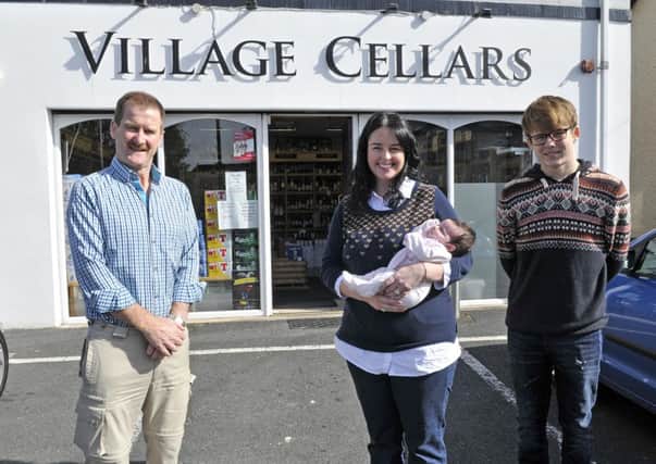 Lorna Maguire, owner of the Village Cellars, Donacloney and daughter Hannah Joy, with Ronnie Dougan, manager and Luke Owens. INLM39-116gc