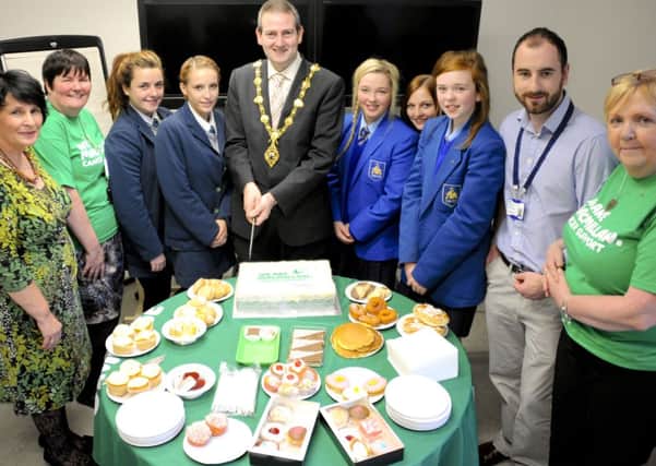 Mayor Martin Reilly with St. Mary's College and Thornhill College pupils at 
a Macmillan fundraising event.