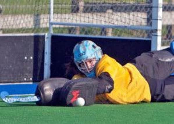 SAMMY SAVES. Pictured doing what she does best is Ballymoney shot-stopper Sammy-Jo Greer in action during her side's 1-1 draw wih Lurgan.INBM40-13 043SC.