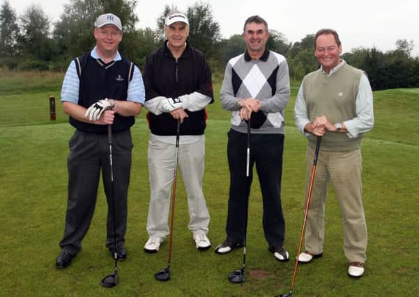 Leonard Craig, Andy McFarland, Raymond Artis and David Caves about to tee off at Galgorm Castle Golf Club. INBT39-220AC
