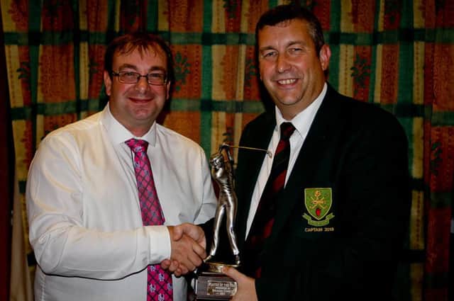 Golfer of the Year Sam Montgomery pictured receiving his trophy from Bushfoot Golf Club Captain, Kenny Gault at the annual presentation of trophies to all winners of competitions throughout the year.