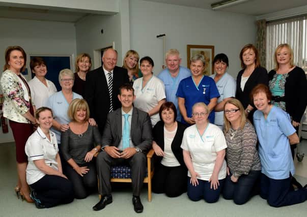 Health Minister Edwin Poots is pictured with Southern Trust staff in the Rapid Access Clinic at Lurgan Hospital. Also pictured is David Simpson MP.