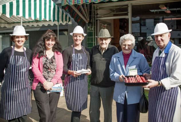 Free grub at a Toon Taster event held at Mulhollan's Butchers, Ballymoney on Saturday. Included are Sean Mulhollan, Brenda Cummings and Catherine Daly & shoppers Vivian McKeown and Sam and Ellen McConaghie.INBM40-13 204JC
