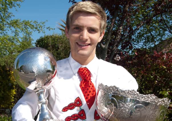 World Champion dancer, Morgan Comer from Kilwaughter, pictured with the trophies that he won in Dublin last week at the World Irish Dancing Championships.  INLT 18-720-BM