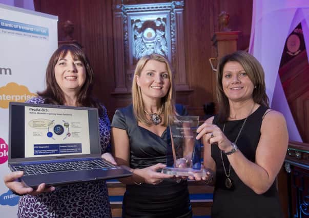 Kelly Moffit (left) and Ballymena woman  Lorraine Martin (centre) from ProAx-Sis, Queens University Belfast, pictured with Julie-Ann OHare of main sponsor Bank of Ireland after being named the overall winner at the NISP CONNECT 25k Awards 2013.