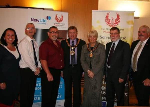 Attending the constitution of the new County Antrim NI Phoenix Organisation group at Mossley Mill are (from left) - Paula Bradley MLA, Alderman Billy Ball, Cllr. Robert Hill, Mayor of Newtownabbey, Alderman Frazer Agnew, Mayoress Mrs Lila Agnew, Minister for Social Development Nelson McCausland MLA, David Crabbe OBE, Chairman of NI Phoenix 
Organisation. INLT 41-650-CON