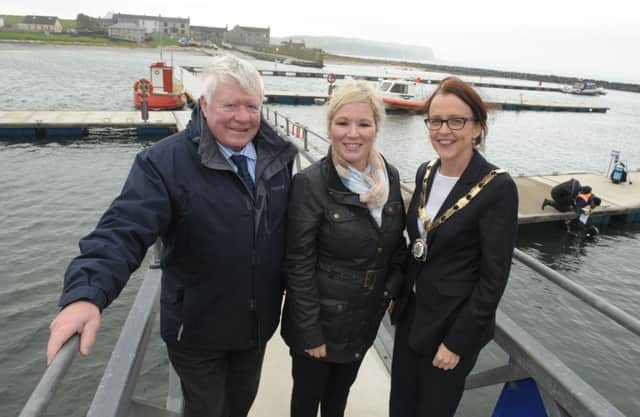 Rural Development Minister Michelle O'Neill visited Rathlin Island to view £350K of new tourist facilities, which included new pontoon facilities and a 30 bed tourist hostel, funded under Axis3 of the Department of Agriculture's Rural Development Programme. Pictured are Malachy McCamphill, Chair of the North East Region RDP local action group, DARD Minister Michelle O'Neill MLA and Cara McShane, Chairperson Moyle District Council. Photo by Simon Graham/Harrison Photography.