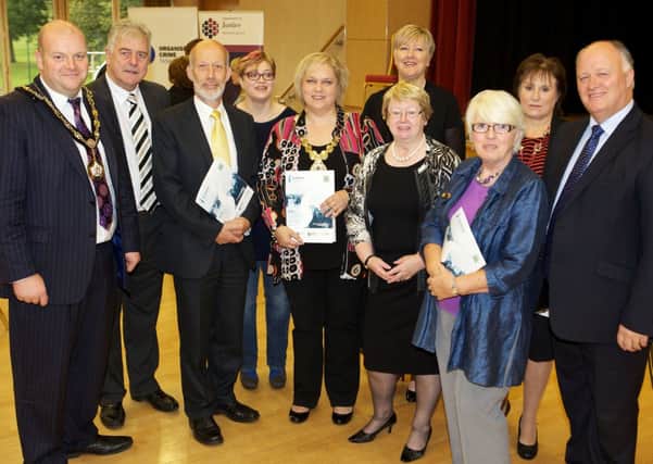 Mayor of Craigavon, Councillor Mark Baxter, Jim Nicholson MEP,
Minister for Justice David Ford MLA and David Simpson MP are joined by
members of the Lurgan Soroptimists including Joanne Harris President,
Patricia Kerr President Elect, Rosemary Fuller, Pamela Mawhinney,
Joyce Simpson and Maureen Maguire at the launch of the educational
resource pack for teachers in the Upper Bann area on human
trafficking.