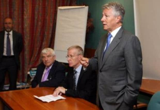 TAKING A STAND. First Minister Peter Robinson addresses staff at County Hall on Wednesday.CR41-104SC.