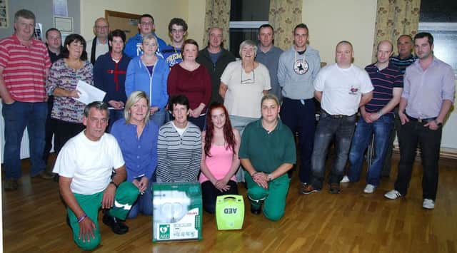 Northwest Community Ambulance Service members Bert Anderson and Denise Gourley photographed last week in Cloughmills Orange Hall where they showed community group members how to do CPR and use a defibrillator. Photography by Hugo McNiece, Digital Image Photography.