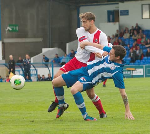 Clear penalty shout for Coleraine as Gary Browne is pushed tothe ground but nothing was given. Picture by Derek Simpson