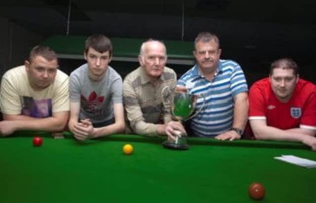 CUE...DRAW. Don Leighton makes the draw for the Marcus Dickson Memorial Trophy with Sammy Walker (committee) looking on along with Curtis Boreland, James Nesbitt and Lee Hull at Potters Snooker Club.CR41-107SC.