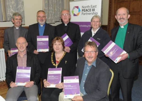 Pictured at the launch of the Dare To Hope project in Larne Town Hall are (back row l- r) Archdeacon Stephen Forde, the parish of St Cedmas; Rev Tommy Stevenson, Larne Methodist circuit; Fr Aiden Kerr, Larne Catholic parish; Capt Sue Whitla, Larne Salvation Army; Rev Dr Colin McClure, First Larne Presbyterian; (front row l-r) consultant Kevin McCaughan; Larne Mayor, Cllr Maureen Morrow; and East Antrim MP Sammy Wilson. INLT 41-685-CON