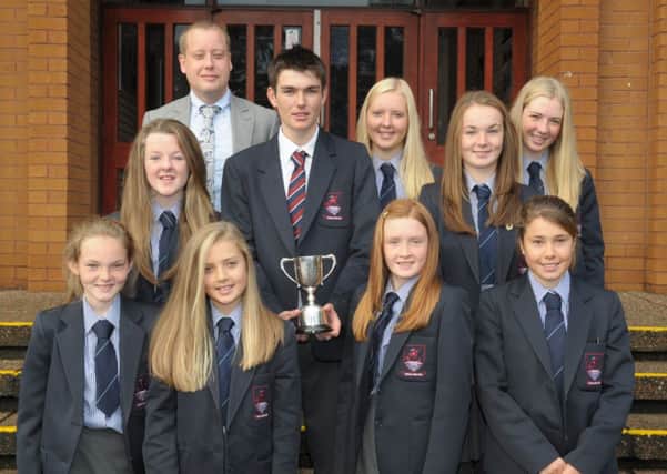 The Larne Grammar School  team, winners of the Schools' Sailing Cup pictured with Principal Mr Wylie.  The team are Katie Kane, Hannah Liddle, Jenna McCarlie, Gary Fekkes, Jocelyn Hill, Lucy Kane, Abby Williamson, Emily Hill and Ellen McCarlie. INLT 41-305-PR