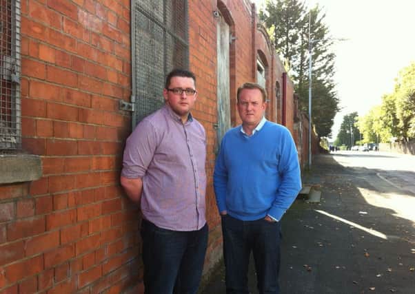 Ulster Unionist Party activist and resident of Mourneview, Aaron Carson with Craigavon Councillor Colin McCusker at the former Bairds factory