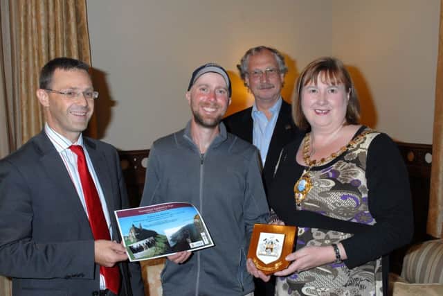 Cotton Joe Norman pictured visiting the Larne Mayor's Parlour as he walks the Appalachian Trail. With him are the Director of Environmental Service Philip Thompson, Larne Mayor Maureen Morrow and Magne Haugseng, Project Management Economusee Northern Europe. INLT 40-347-PR