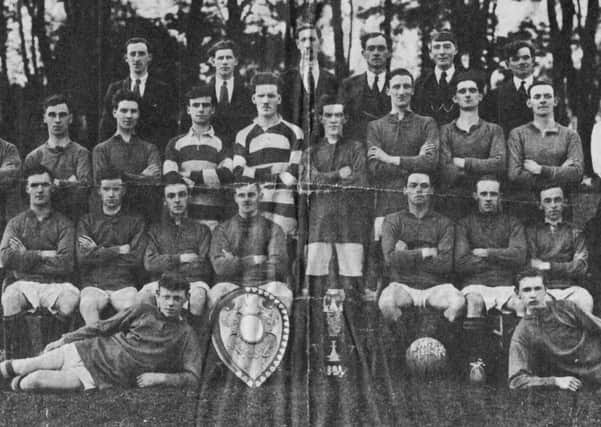 Victoria Rangers Football Club, winners of the Irish Junior Challenge Cup and the County Antrim Junior Shield (1922-23). Back row: S. Stewart. J. McAuley, T. Alexander, G. Avery, W. Templeton, S. Law. Middle row: T. Alexander, A.G. Boyle, H. Manson, W. Lorimer, J.K. Montgomery, P. Kelly, T. McReynolds, W.S. McLaughlin. R. Mooody, J.F. Moody. Sitting: W. Tuff, J. O'Hara, W. Leitch, M. McCarley, W.T. Greer, W.S. Cairns, Charlie McGarry, J. McCready. Lying: F. Barr and W. Houston.