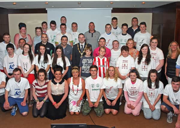 The Mayor of Londonderry Councillor Martin Reilly, pictured with guests and teenagers  attending the Teenage Kickz evening in the Tower Hotel.  INLS 2413-502MT.