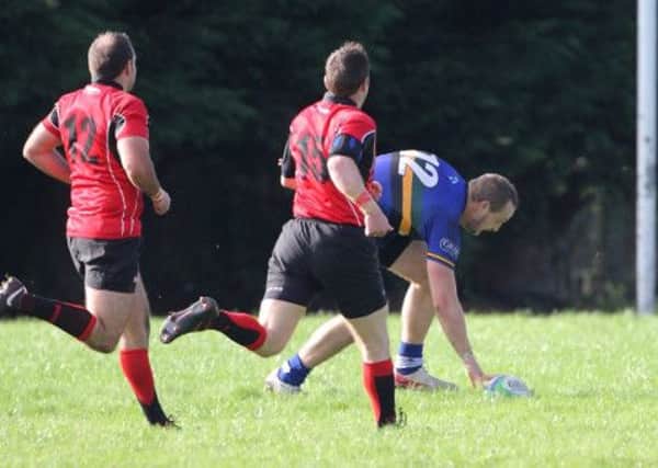 Lisburn scores a try during Saturday's match against Carrick, at Lisburn Rugby Club. US1341-528cd