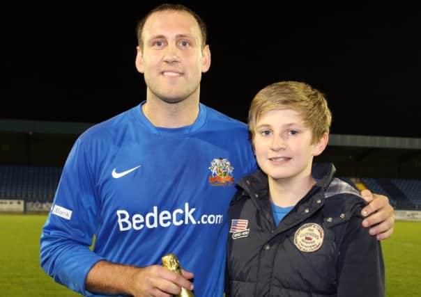 Ross Follis sponsored the Glenavon Man of the Match award and here he presents it to his choice, Guy Bates who scored twice and also provided an assist. Photo by Philip Hawthorne