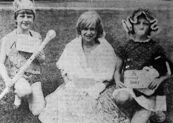 1982 - Three of the competitors in the fancy dress parade at the Waveney Community Centre. From left: Lisa McNeely, Paula and Debbie Graham. INBT30-753F