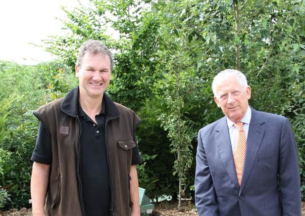 Ballymena farmer Mike Frazer with one of his Dexter cows and presenter Nick Hewer during filming for The Farm Fixer to be broadcast on Monday, October 21 on BBC One Northern Ireland at 7.30pm.