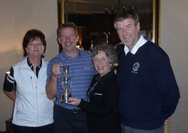 Winners of the Lynas Foods Mixed Competition Jimmy Robinson and Sue McDonagh with Lady Captain Noeleen Houston and Gents Captain Glenn Willis.