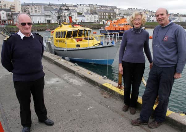 Robert Anderson pictured with Jane Maufe and David Cowper of the Polar Bound in Portrush Harbour.  INCR42-157PL