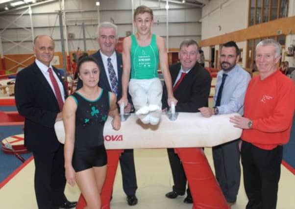 Pictured (l-r) are Jim Rose, Director of Leisure Services; Emma Gorman, Gymnast; Councillor Alan Carlisle, Vice Chairman of the Leisure Services Committee; Ewan McAteer, Gymnast; Alderman Paul Porter, Chairman of the Leisure Servcies Committee; Conleth Donnelly, Sport NI and Tony Byrne, Salto Gymnastics Club.