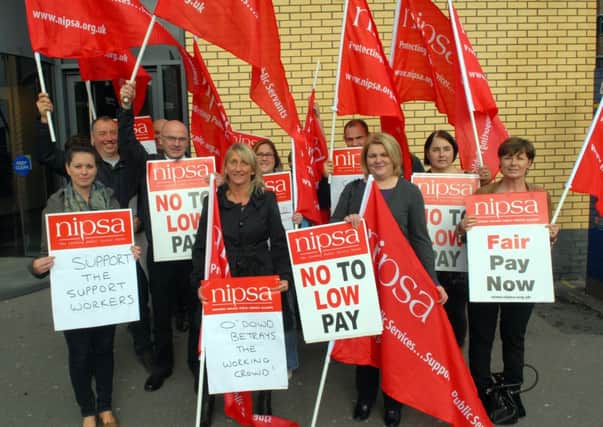 Education workers and members of NIPSA who held a protest outside Lisburn Library against ongoing pay freezes. INUS4113-NIPSA