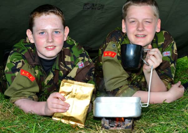 Taking full advantage of the serious fun on offer at this years Annual Camp are Cadets Harry Dempster and Jayden Joseph, members of the Cambridge House School Detachment ACF.