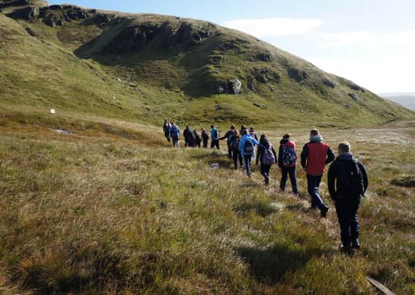 Lisneal's charitable mountaineers set off on their trek in Donegal.