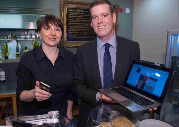 NRC Lecturer Paul Garrett who delivered the DEL funded Employer Support Programme to the staff at Rocca Restaurant/Café is pictured with Sylvia Tumelty, Manager. INCR43-127(S)