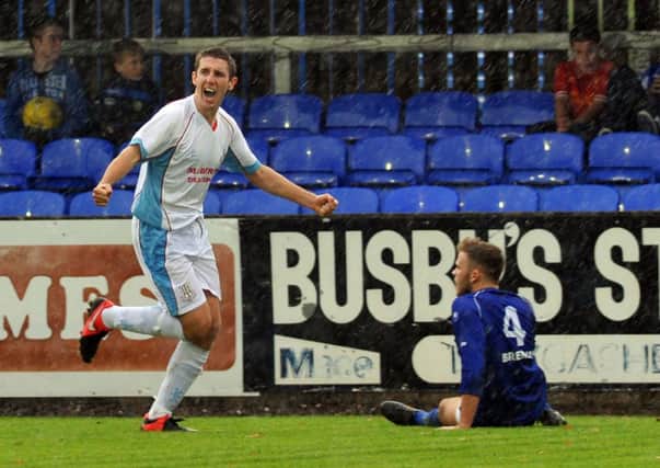 Ballymena's Gary Thompson 
celebrates after putting United 2-0 ahead at Stangmore Park. Picture: Press Eye.