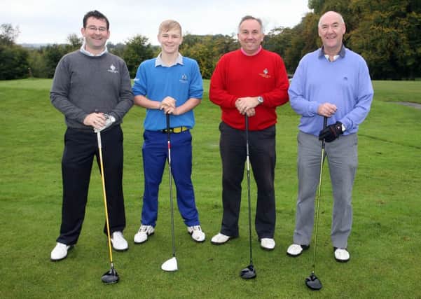 Peter Daley, Owen Daley, Keith Dinsmore and Alistair McKerville on the 1st tee at Galgorm Castle Golf Club. INBT43-246AC