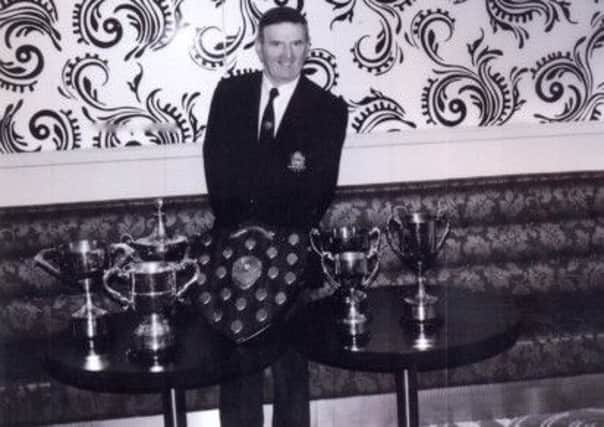 Alan Smith pictured with his six trophies, which he won during the City of Derry Bowling season.
