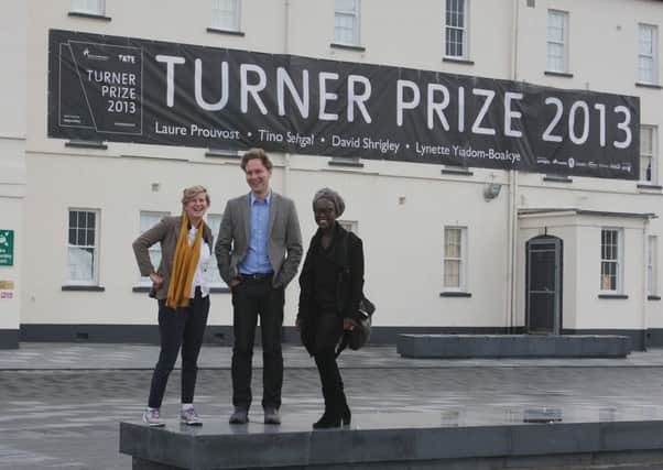 Turner Prize nominees Laure Prouvost, David Shrigley and Lynette Yiadom-Boakye enjoying a break in Derry yesterday.  (DER4313JB0810))