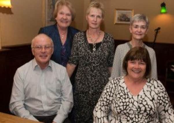 QUESTION TIME. Maurice and Marie McHenry, who acted as quizmaster and scorekeeper at the Ballymoney Soroptomists table quiz on Thursday night at BRFC, pictured along with Press & Publicity Officer Dr Betty McGavock and joint Presidents Elizabeth McFetridge and Barbara Kerr.INBM43-13 021SC.